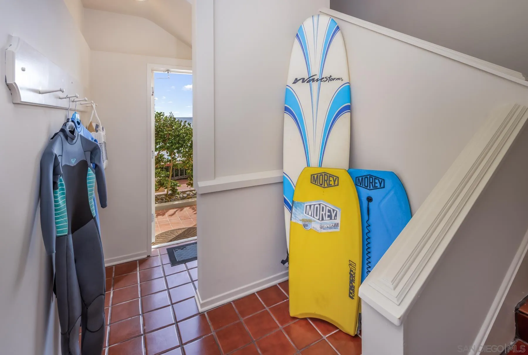 2977 Ocean Street Carlsbad, CA 92008 - Photo 27 of 44 a view of walk in closet with clothes and shoes
