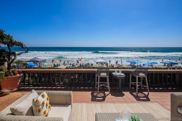 a view of a chairs and tables in patio