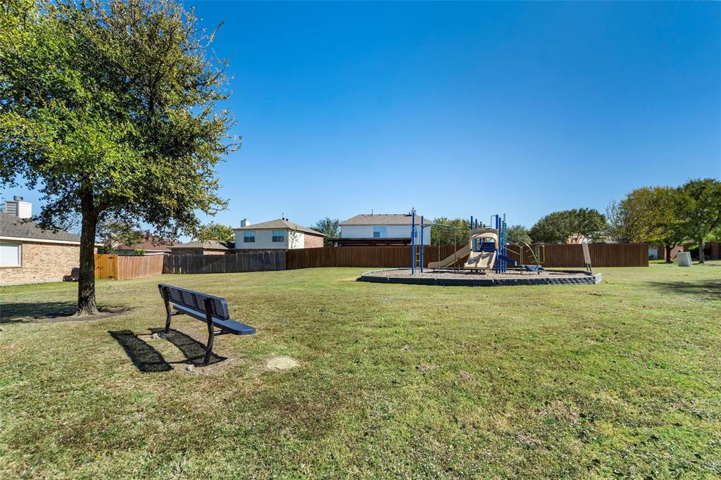 1002 Manassas Drive Forney, TX 75126 - Photo 16 of 26 a view of a park with large trees