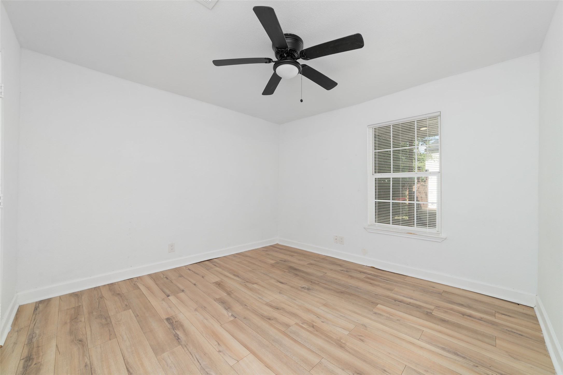 7125 Conley Street Houston, TX 77021 - Photo 12 of 32 Second of four bedrooms in this home.