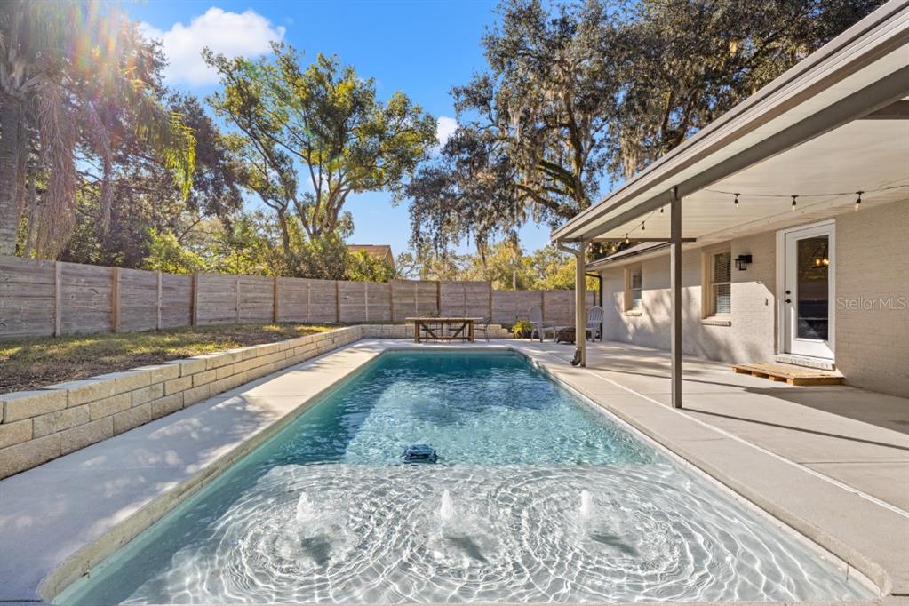 12414 Fort King Road Dade City, FL 33525 - Photo 47 of 60 a view of a yard with wooden fence