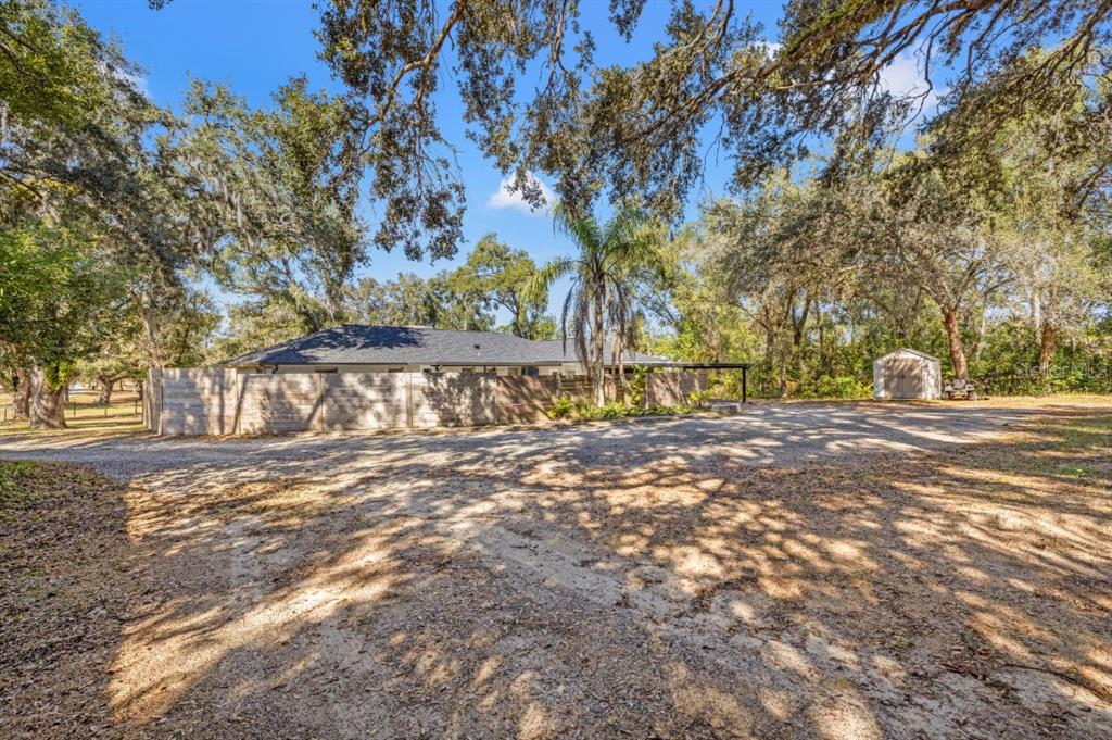 12414 Fort King Road Dade City, FL 33525 - Photo 58 of 60 a view of road and trees
