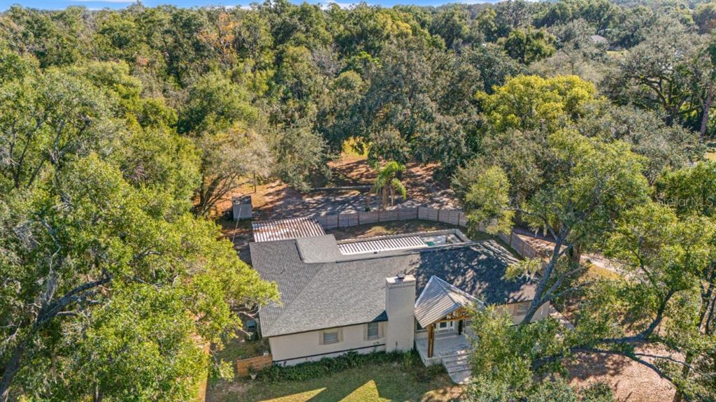 12414 Fort King Road Dade City, FL 33525 - Photo 6 of 60 an aerial view of a house with a yard