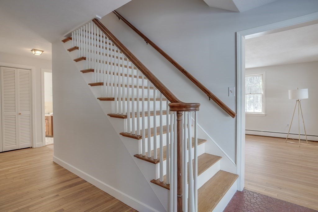 76 Brook Trail Road Concord, MA 01742 - Photo 18 of 33 a view of entryway with wooden floor