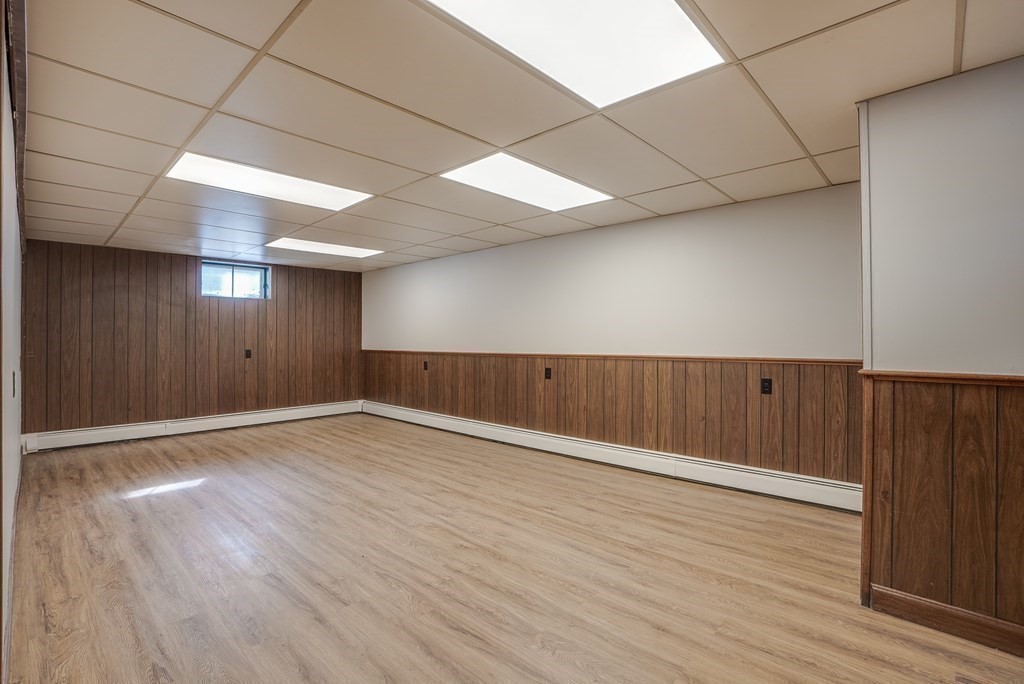 76 Brook Trail Road Concord, MA 01742 - Photo 26 of 33 a view of an empty room with wooden floor