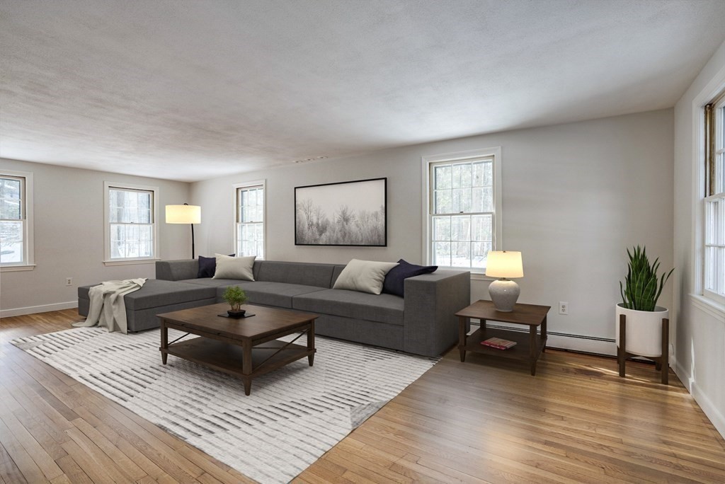 76 Brook Trail Road Concord, MA 01742 - Photo 4 of 33 a living room with furniture and wooden floor