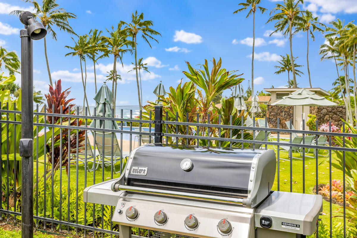 2371 Ho'ohu Road, Unit 801 Koloa, HI 96756 - Photo 23 of 28 a view of a chairs and table in a patio