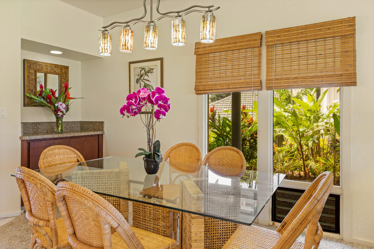 2371 Ho'ohu Road, Unit 801 Koloa, HI 96756 - Photo 7 of 28 a bathroom with a granite countertop sink a mirror and vanity