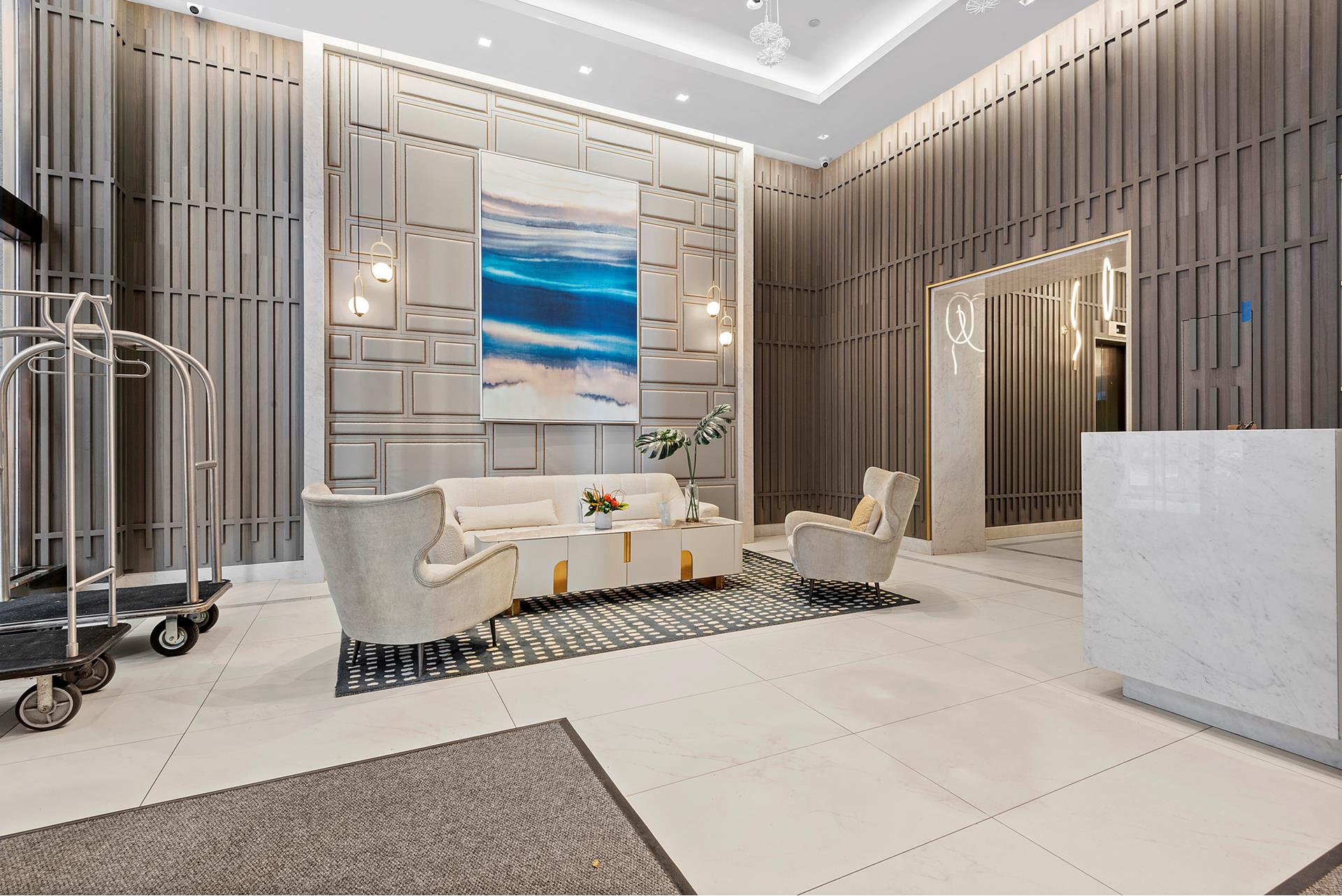 75 Wall Street, Unit 27J Manhattan, NY 10005 - Photo 8 of 8 a living room with patio furniture