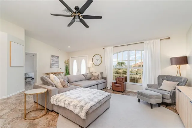 a living room with furniture and a table
