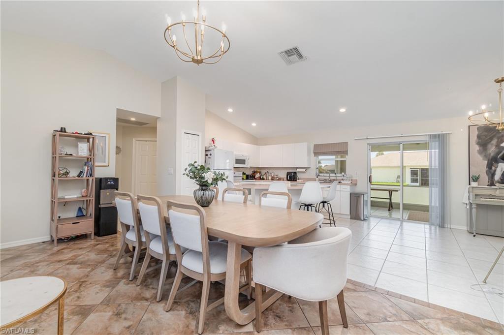 879 Rue Labeau Circle Fort Myers, FL 33913 - Photo 12 of 27 a view of a dining room with furniture