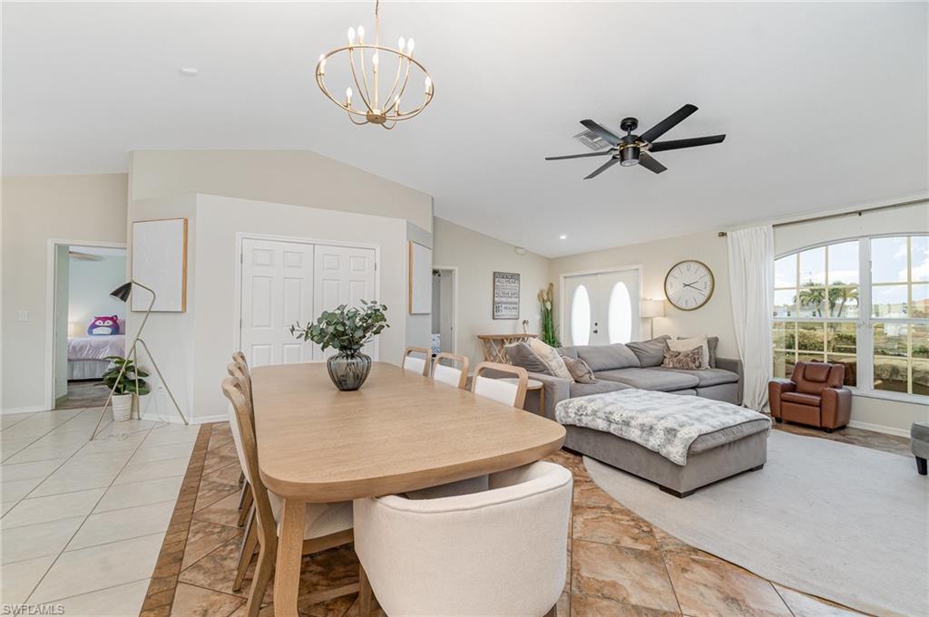 879 Rue Labeau Circle Fort Myers, FL 33913 - Photo 13 of 27 a living room with furniture and a table
