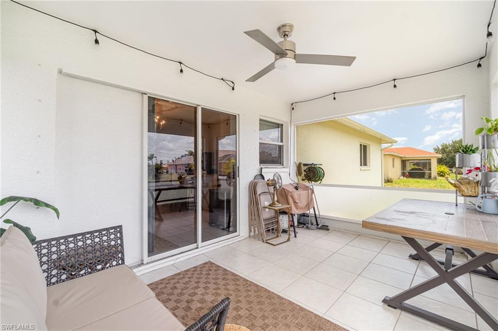 879 Rue Labeau Circle Fort Myers, FL 33913 - Photo 25 of 27 a living room with furniture and a window