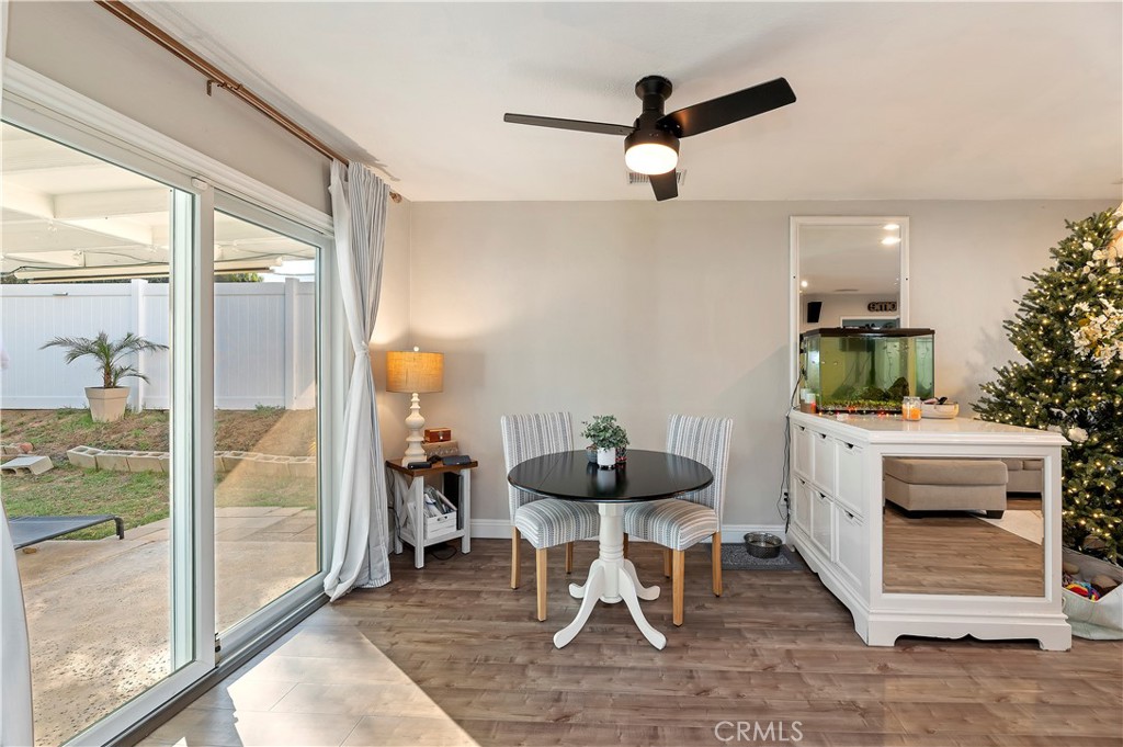 25143 Sugar Hill Road Moreno Valley, CA 92553 - Photo 11 of 28 a view of a dining room with furniture window and outside view