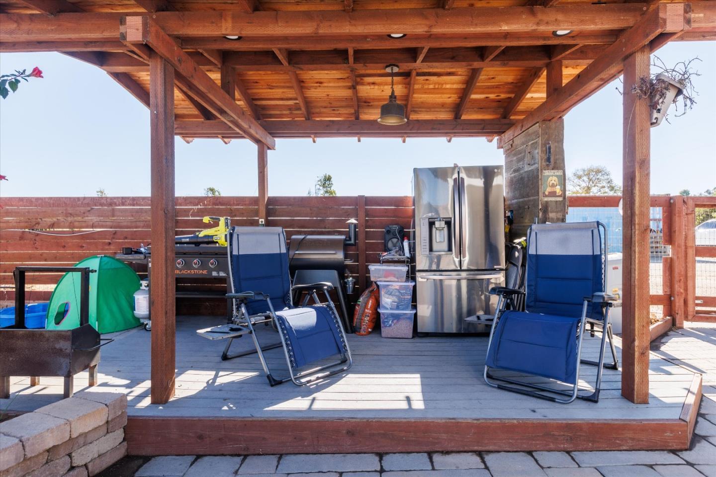 840 South Oak Glen Avenue Nipomo, CA 93444 - Photo 15 of 21 a view of a chairs and table in the patio