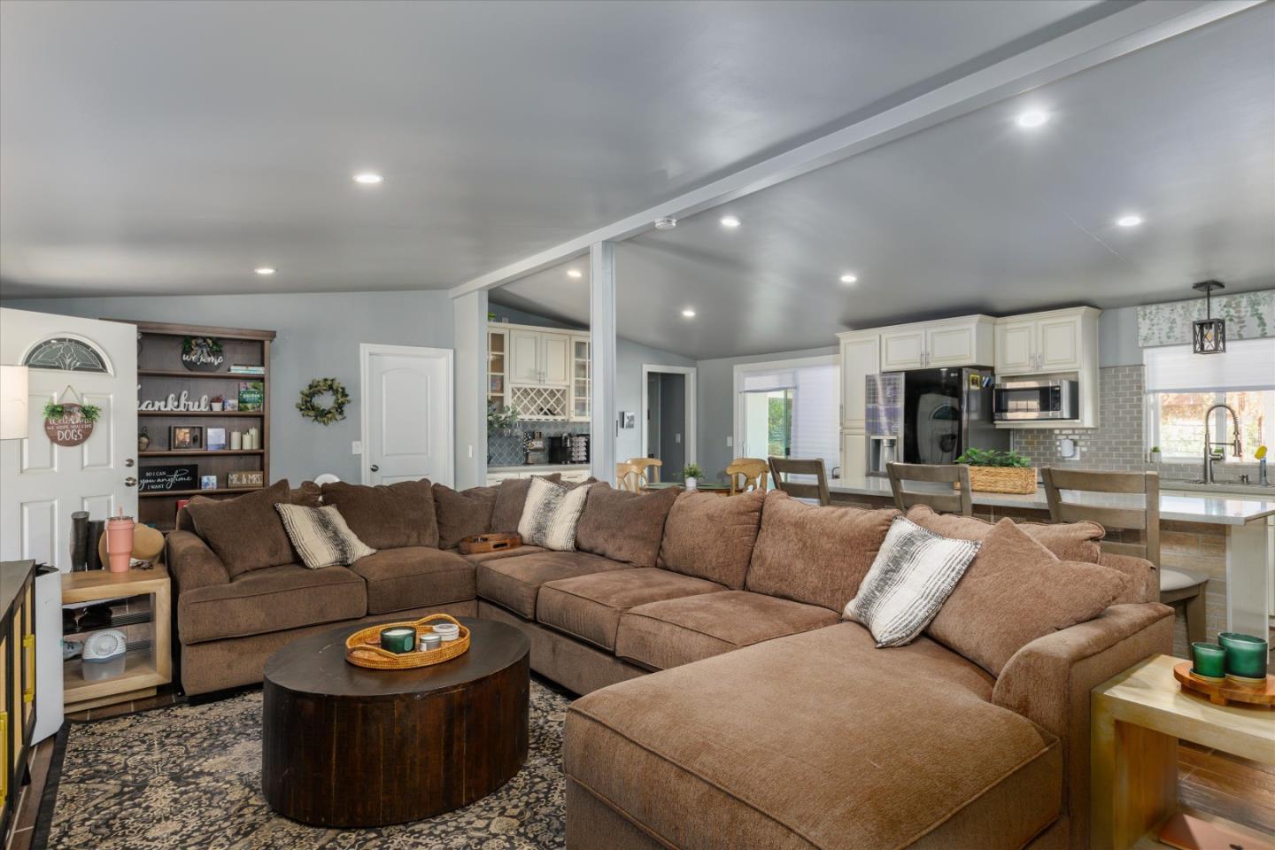 840 South Oak Glen Avenue Nipomo, CA 93444 - Photo 18 of 21 a living room with furniture and a couch