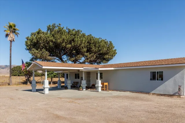 front view of a house with a patio