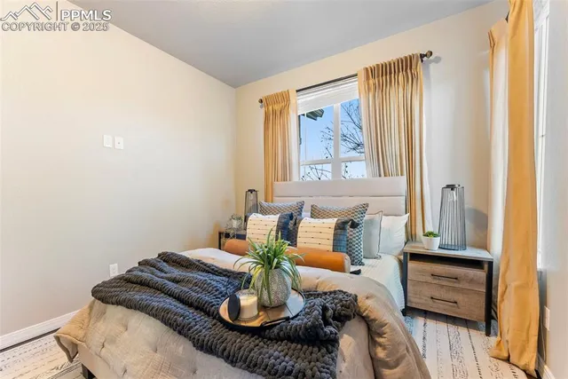 a bathroom with a double vanity sink and mirror