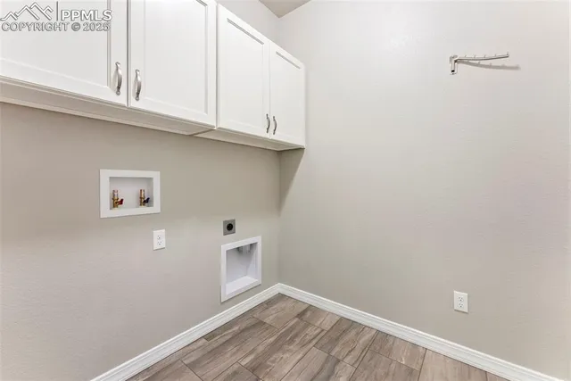 a bathroom with a double vanity sink a toilet a mirror and shower