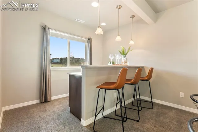 a view of a house with a garage