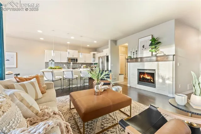 a kitchen with a sink appliances and cabinets