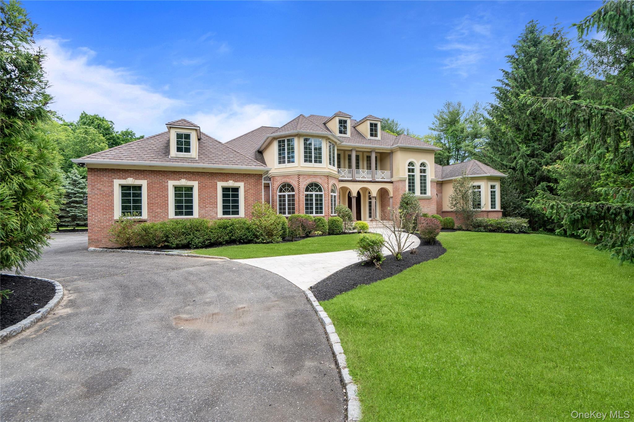 1960 Midlane Road South Syosset, NY 11791 - Photo 1 of 46 a front view of a house with a yard