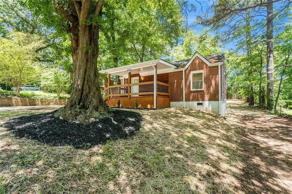 2174 Rexford Drive Decatur, GA 30034 - Photo 1 of 1 a view of a house with a yard