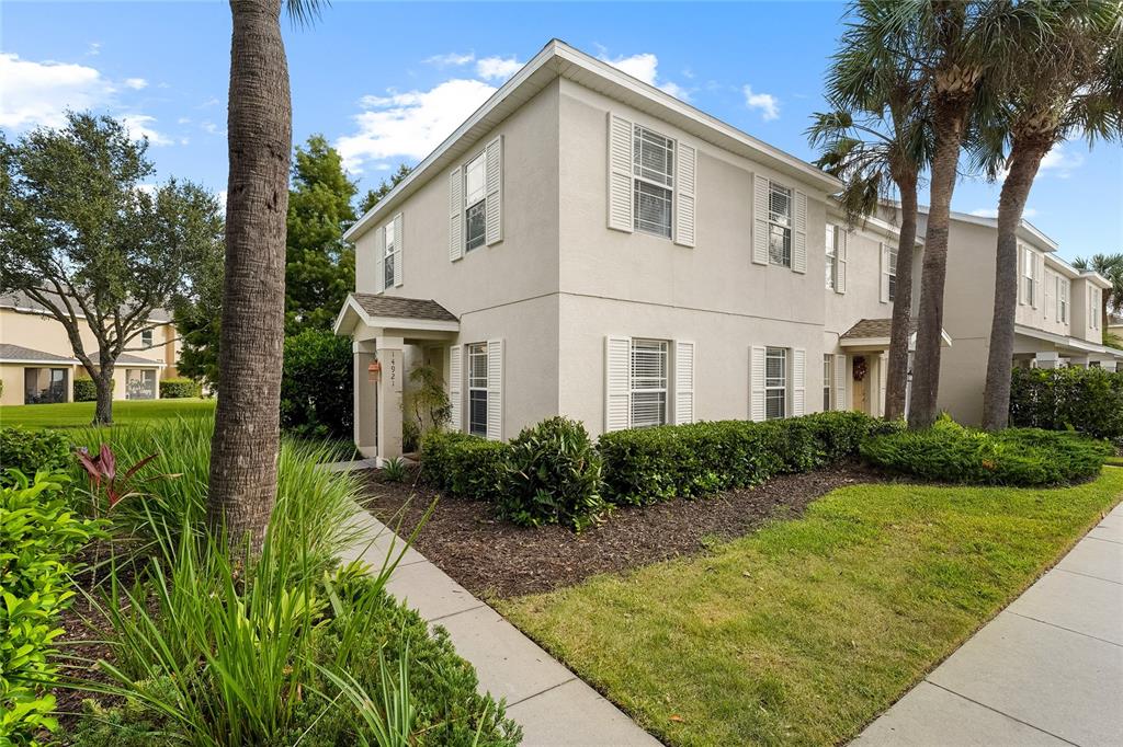 14921 Amberjack Terrace Lakewood Ranch, FL 34202 - Photo 1 of 1 a view of a white house with a yard and plants