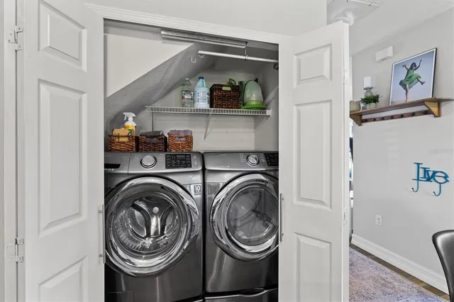 a utility room with dryer and washer
