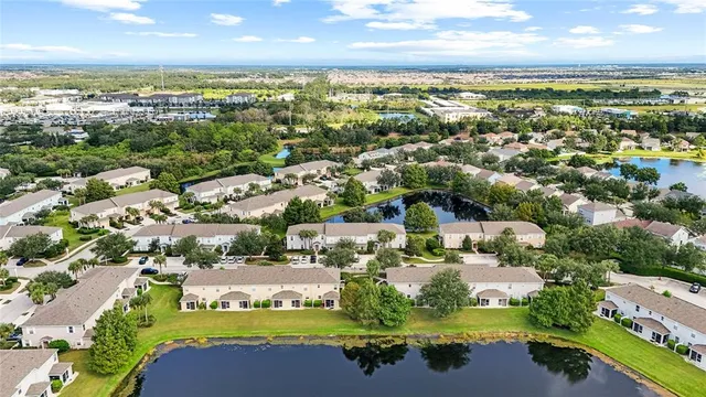 an aerial view of residential building and ocean