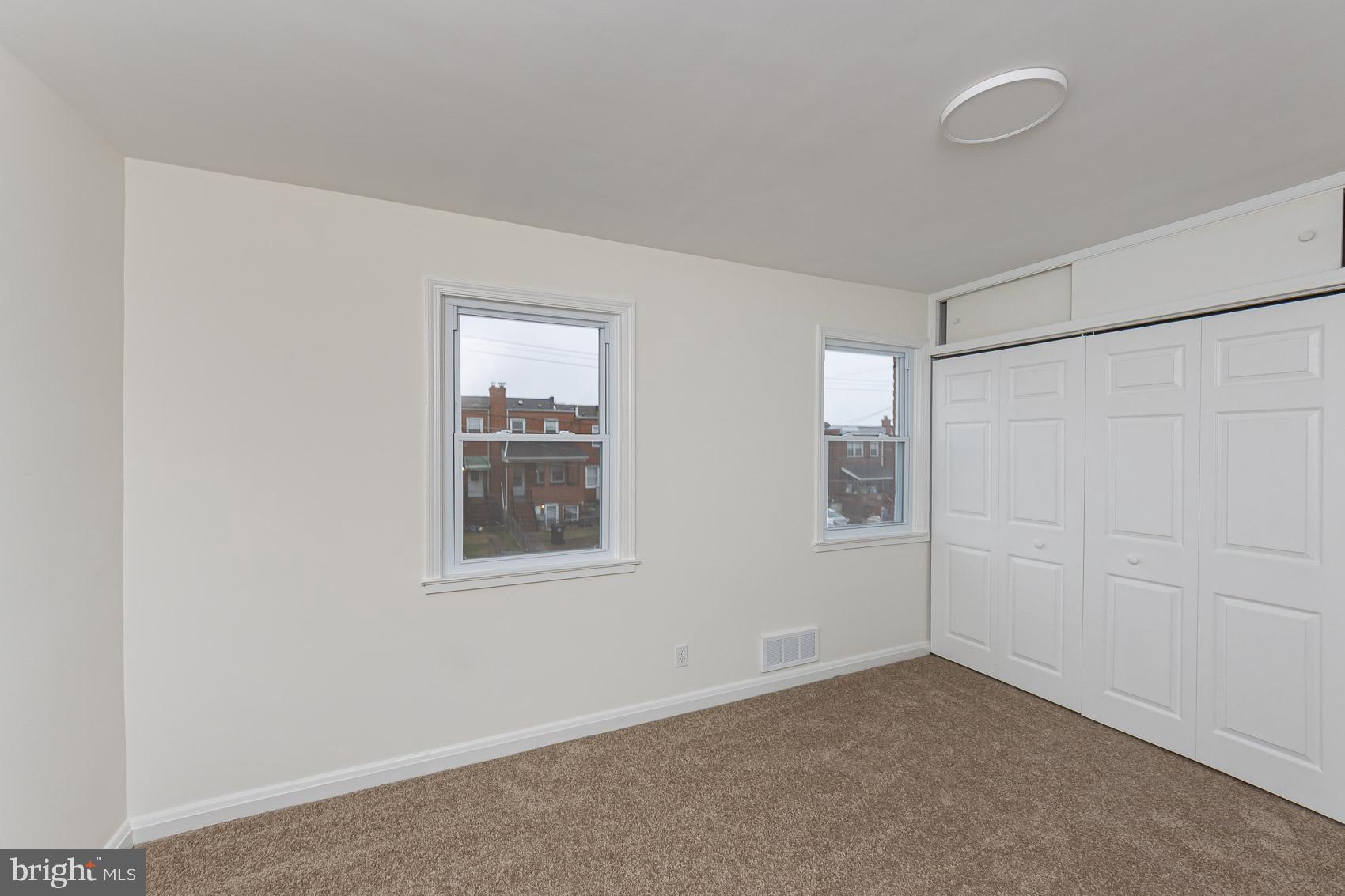 7035 Gough Street Baltimore, MD 21224 - Photo 15 of 25 an empty room with a window