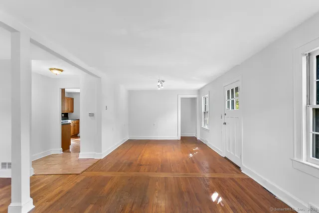 a view of an empty room and window
