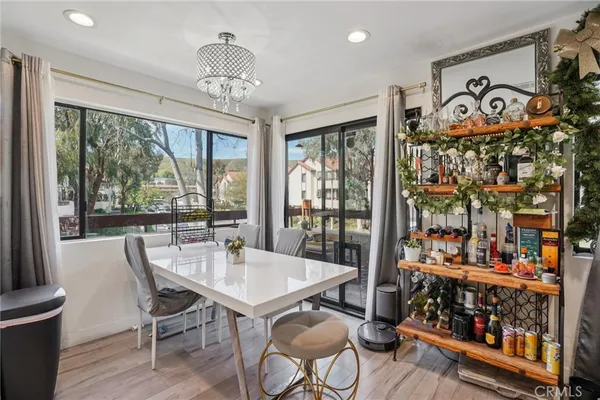 a view of a dining room with furniture window and outside view