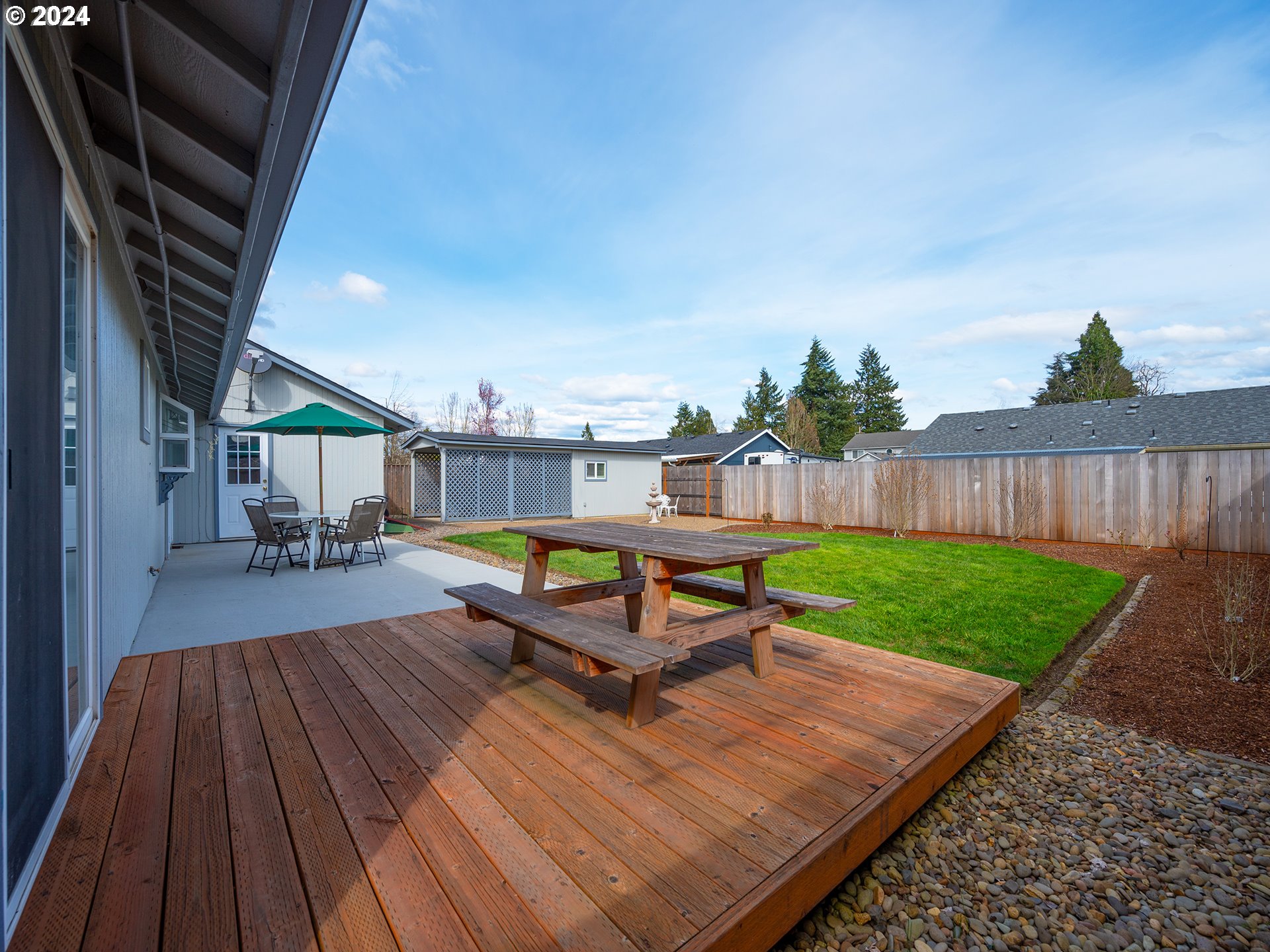 889 Aldridge Place Springfield, OR 97478 - Photo 29 of 46 a sitting area with chairs and wooden fence