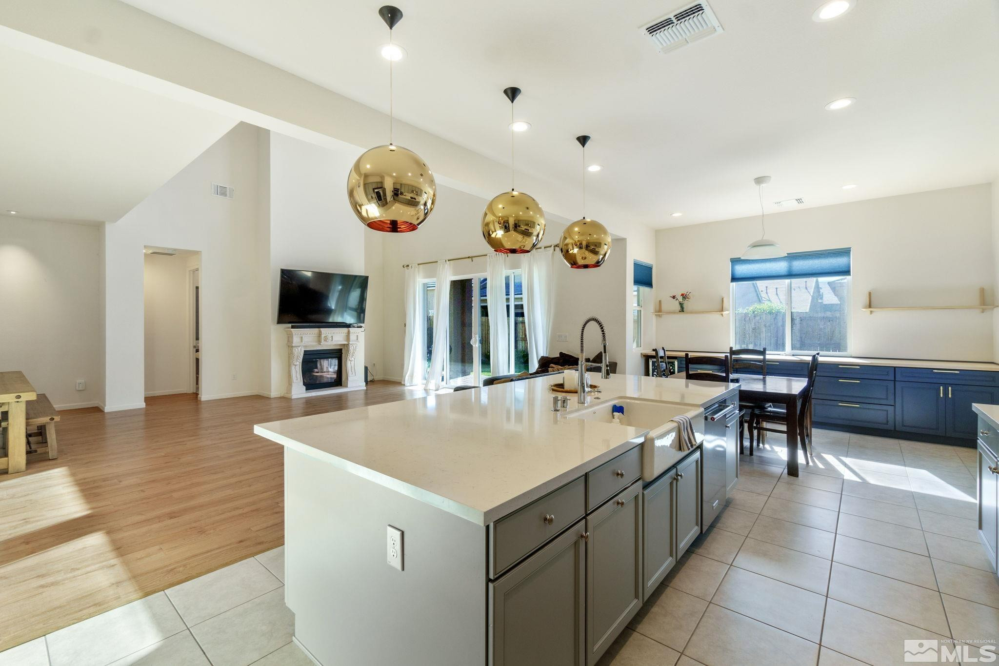 9401 Flying Horse Road Reno, NV 89521 - Photo 11 of 40 a large white kitchen with a large lots of counter space and window