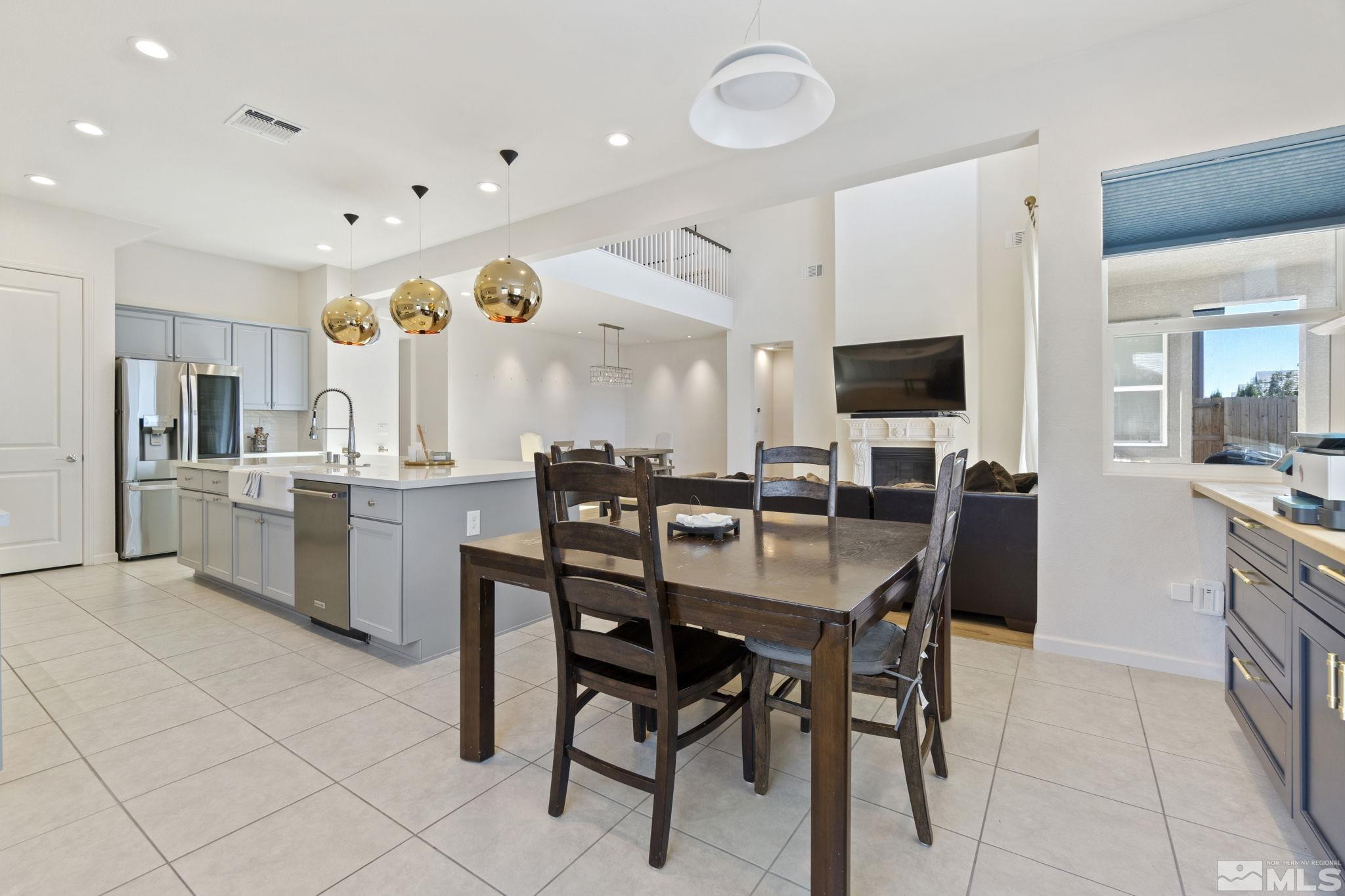 9401 Flying Horse Road Reno, NV 89521 - Photo 14 of 40 a kitchen with a table and chairs in it