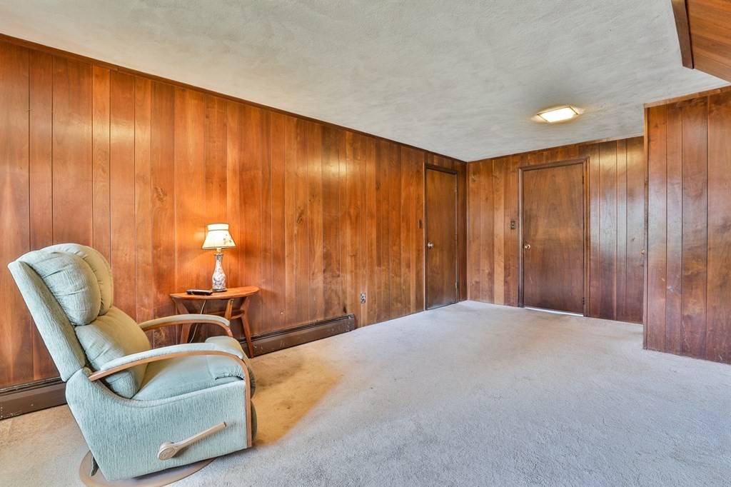 44 Cottonwood Road Wellesley, MA 02482 - Photo 38 of 40 a balcony with table and chairs