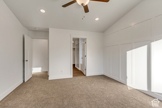 3357 South 960 West Logan, UT 84321 - Photo 7 of 17 Vaulted ceiling featuring a ceiling fan with integrated lighting