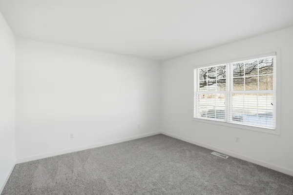 an empty room with a window