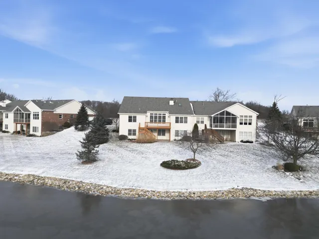 a view of house with outdoor space and sitting space