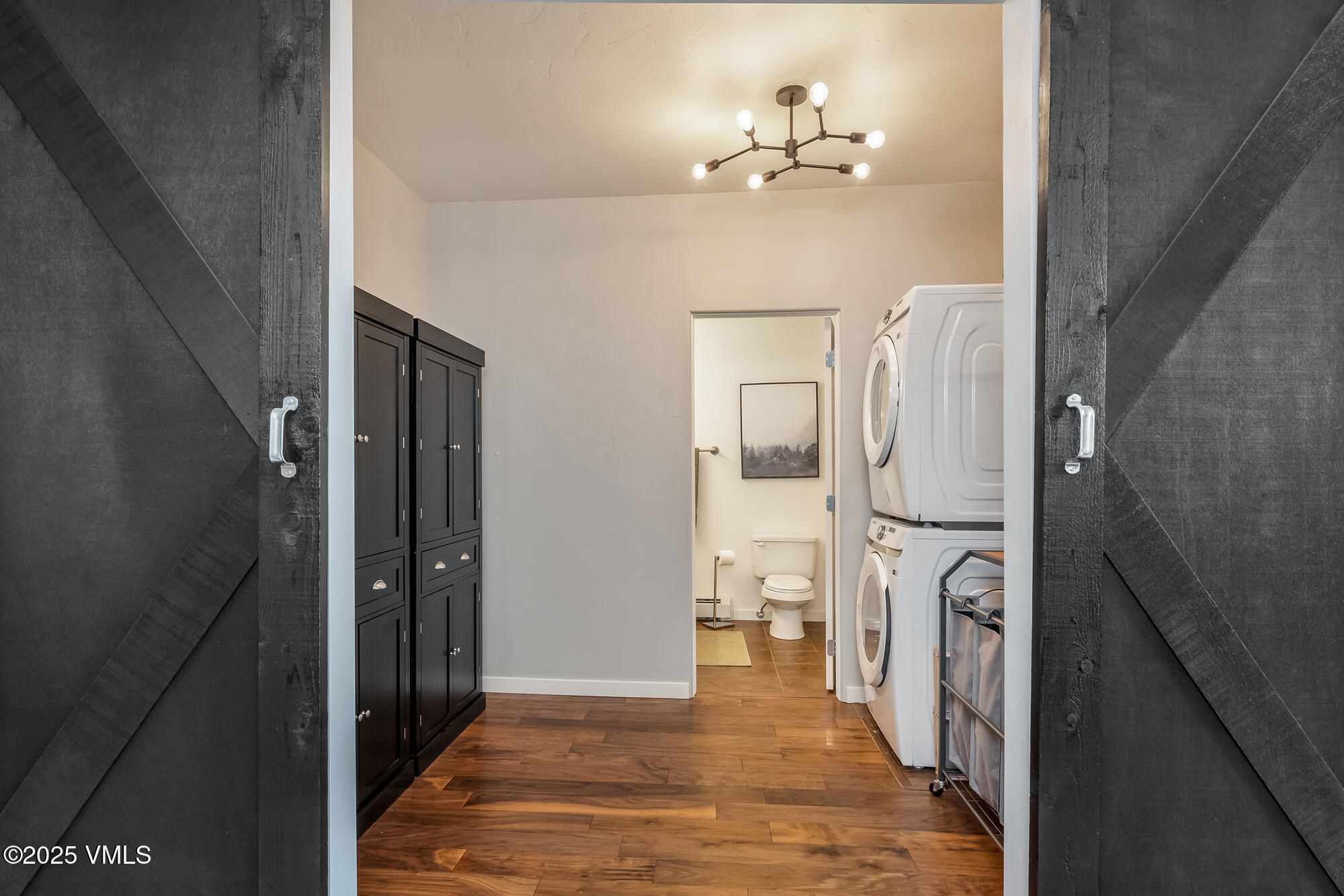 705 Nogal Road, Unit A8 Eagle, CO 81631 - Photo 15 of 33 wooden floor in an empty room and a bathroom