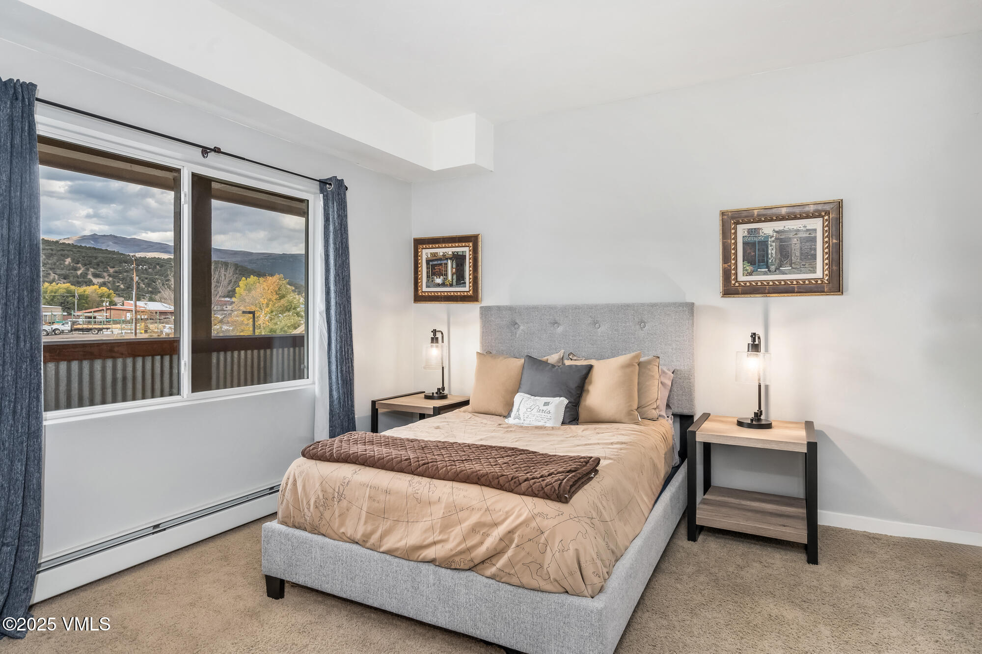 705 Nogal Road, Unit A8 Eagle, CO 81631 - Photo 17 of 33 a bedroom with a bed and a large window