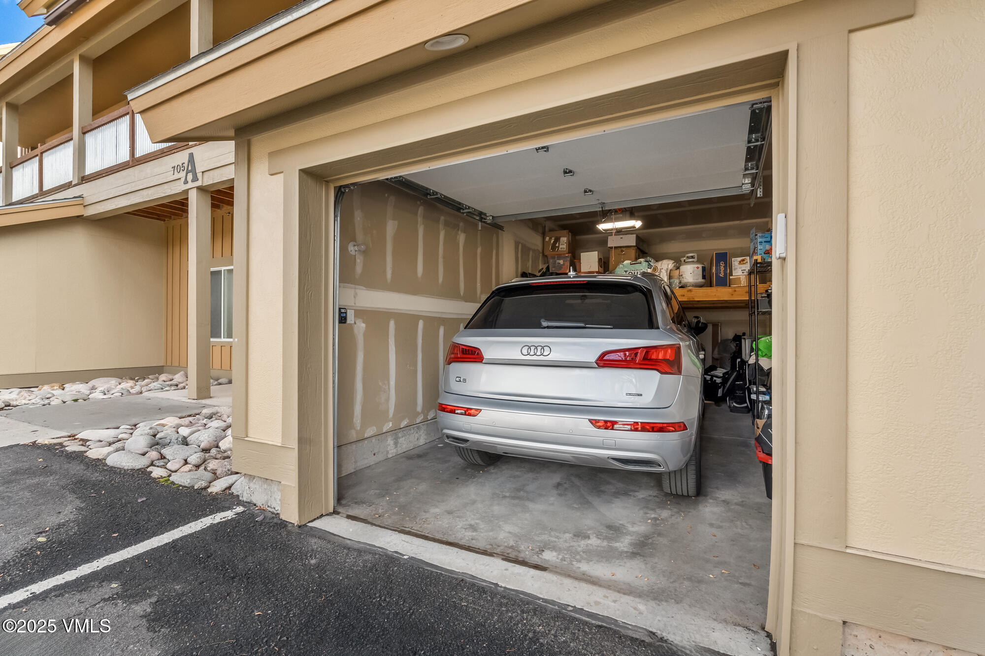 705 Nogal Road, Unit A8 Eagle, CO 81631 - Photo 25 of 33 a car parked in front of a building