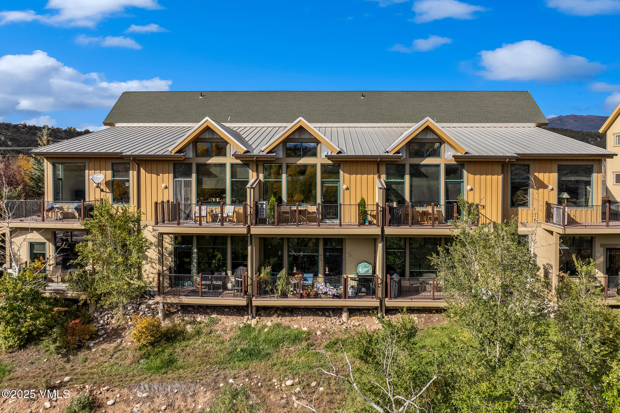705 Nogal Road, Unit A8 Eagle, CO 81631 - Photo 28 of 33 a front view of a house with garden