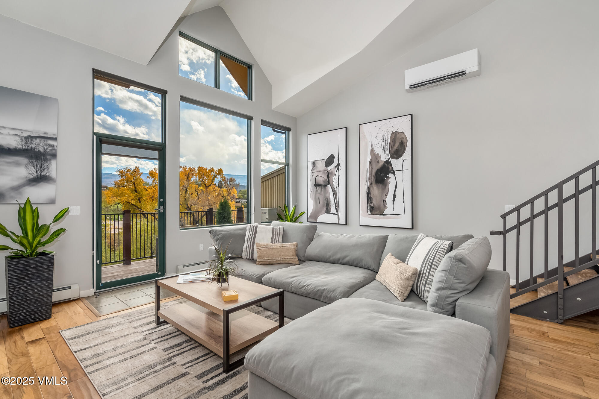 705 Nogal Road, Unit A8 Eagle, CO 81631 - Photo 3 of 33 a living room with furniture and a large window