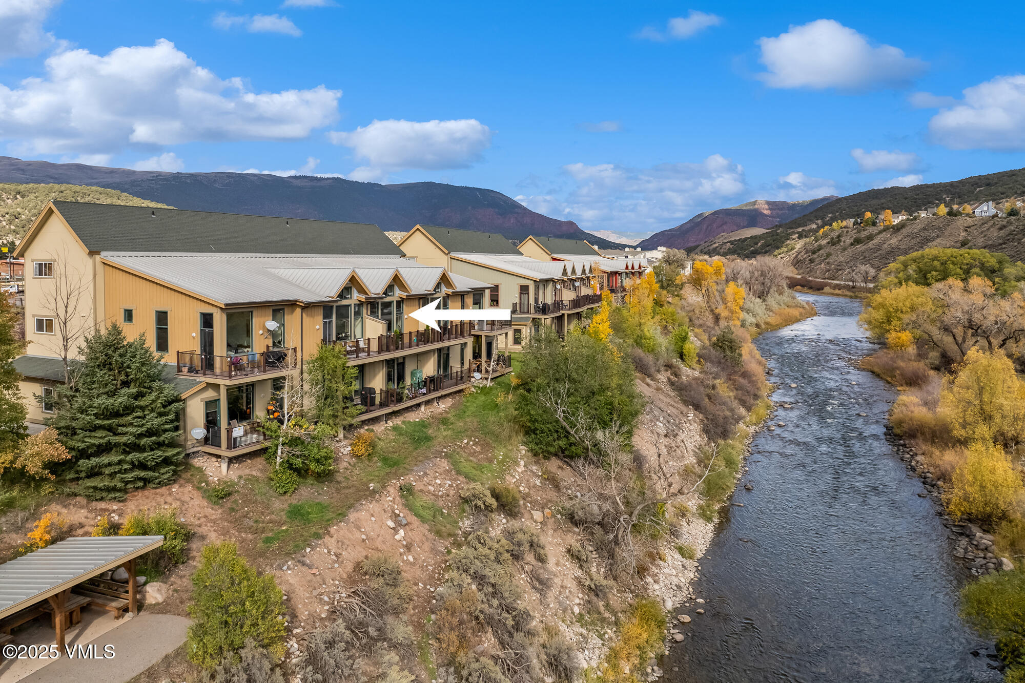 705 Nogal Road, Unit A8 Eagle, CO 81631 - Photo 31 of 33 a view of a house with a yard