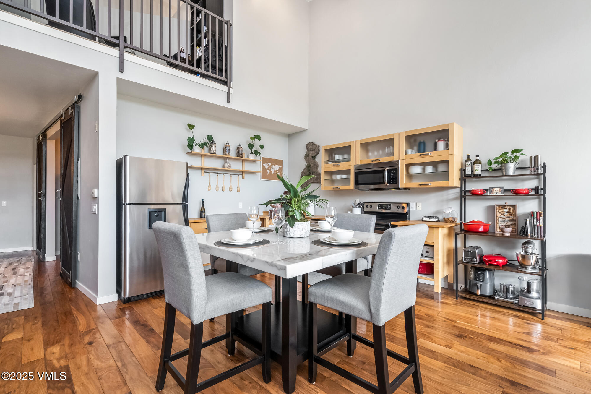 705 Nogal Road, Unit A8 Eagle, CO 81631 - Photo 9 of 33 a view of a dining room with furniture and a kitchen