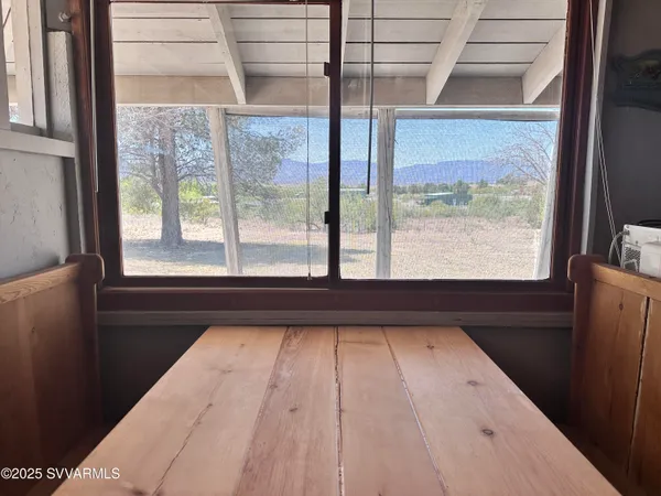 a view of an empty room with a fireplace
