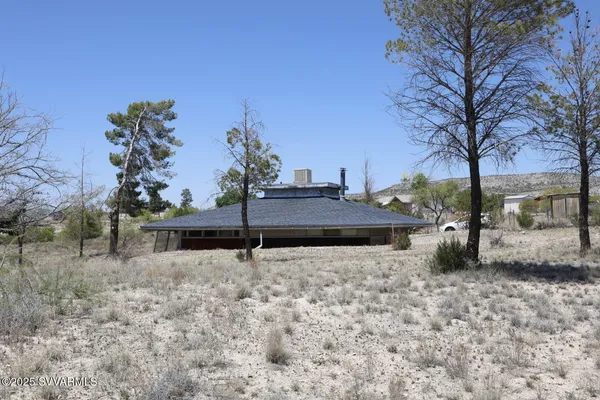 a view of a terrace with a yard