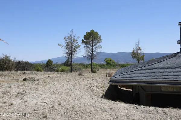 a view of lake with mountain